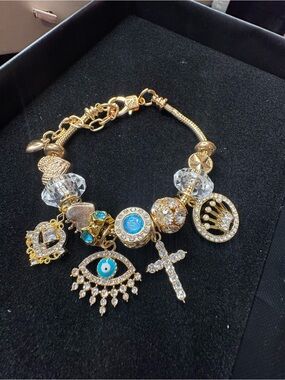 Gold Charm Bracelet with Blue Evil Eye and Crystal Accents
